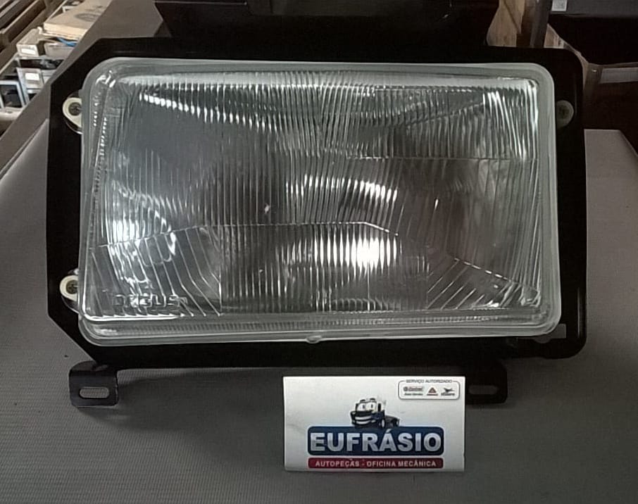 FAROL VW CAM 7100 8120 8150 00ED ESQUERDO QUADRADO